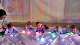 Escola Infantil Apolo 10 niños con luces